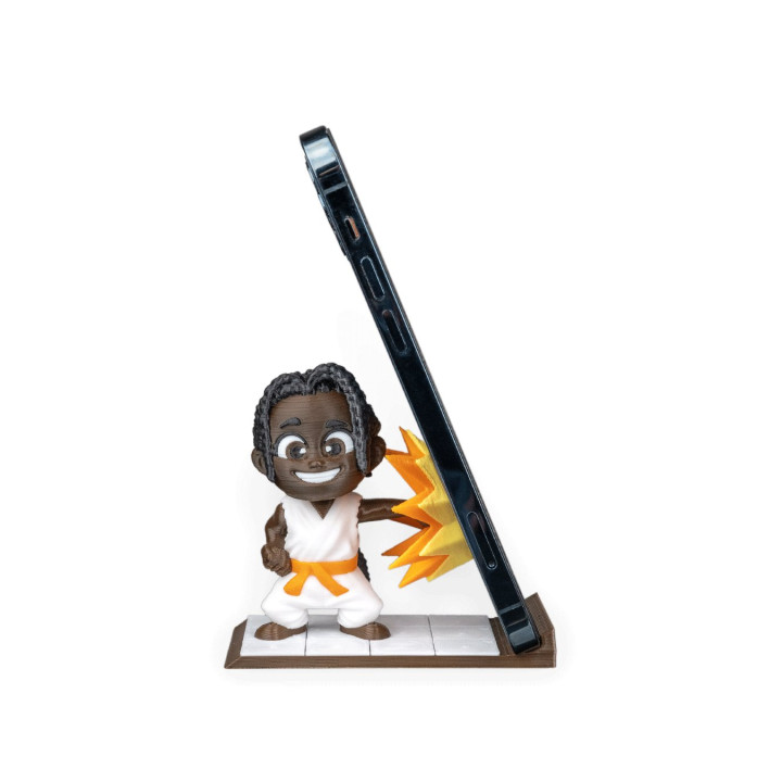 Support Téléphone Figurine Punchline – Le Karatéka Qui Tient Votre Phone