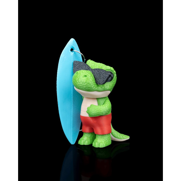 Tyrannosurf – Porte-Clés Dinosaure Surfeur