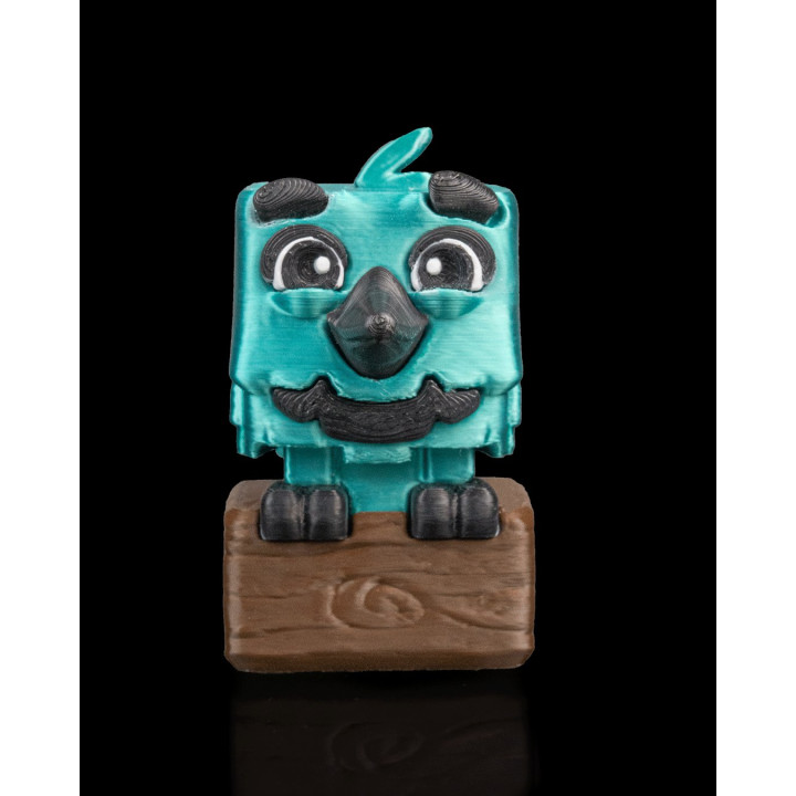 Humming Qbird – Figurine Oiseau Cubique Turquoise Sur Bûche
