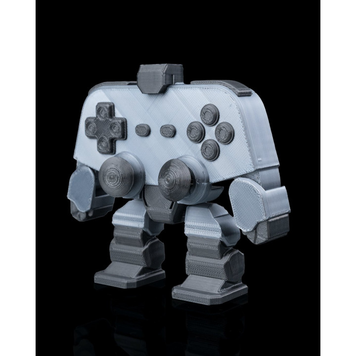 Arcadion – Le Robot Manette De Jeu Figurine Décorative