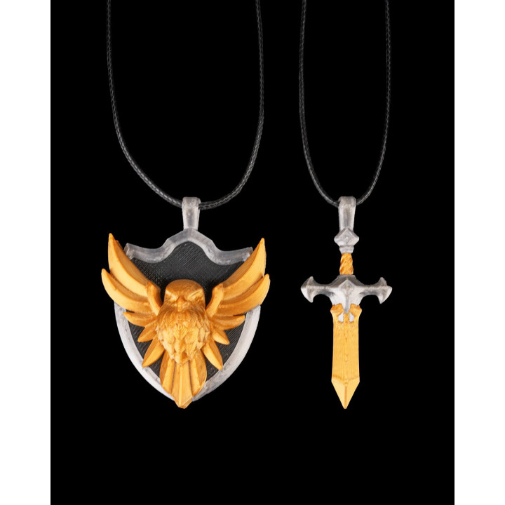 Pendentifs Acier & Plume – Duo Épée & Bouclier Aigle